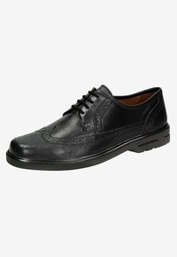 Zwarte leren dressshoe met een spitse neus, decoratieve perforaties en een gestructureerde buitenzool. Beschikt over een traditionele vetersluiting en een glanzende afwerking.