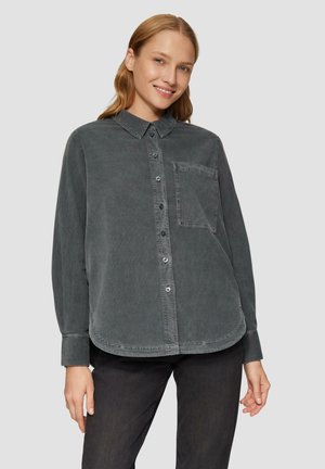 Gray, button-up shirt made of soft fabric; features a classic collar, long sleeves, and a chest pocket; subtle faded texture.