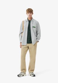 Lacoste Poloshirt - vert yzp
