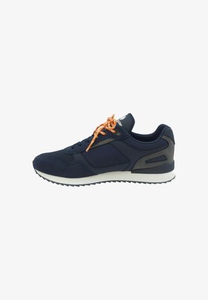 Navy blue athletic shoe with suede and mesh materials, orange laces, white midsole, and textured rubber outsole. Features a logo on the tongue.