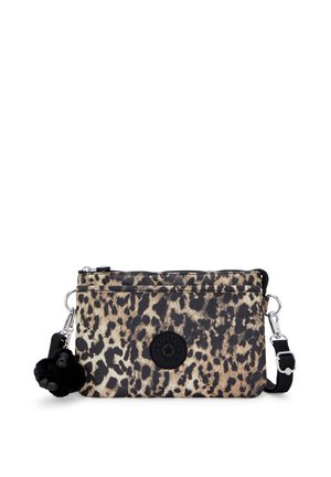 Leopard print crossbody bag made of fabric. Features a zip closure, a black logo patch, and a black pom-pom accent. Adjustable strap included.