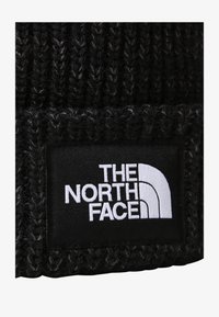 Selezionato, tnf black