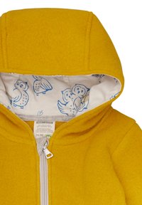 Geel wollen hoodie met een grijze rits, voorzien van een witte voering bedrukt met blauwe uilen. Zachte textuur; gestructureerd ontwerp met een capuchon.