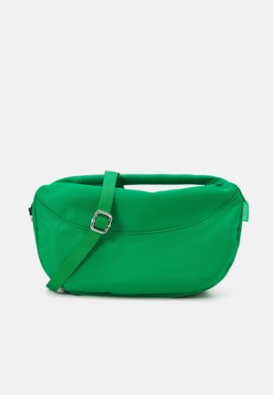 Bright green rectangular crossbody bag with adjustable strap and top handle, featuring subtle stitching and small side brand tag.