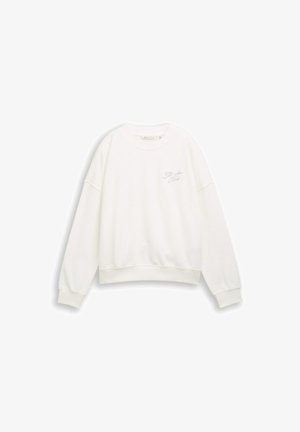 Biała krótka bluza wykonana z miękkiej tkaniny, z opuszczanymi ramionami, ściągaczami na rękawach oraz subtelnym haftowanym logo na piersi.