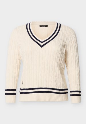 Kreemikas soonikkoes V-kaelusega kampsun tumesiniste topelttriipudega krae, varrukaotste ja ääri juures, pikkade varrukatega ja keha jälgiv.