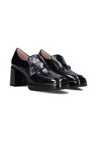 Navy patent leather block-heeled shoes with a rounded toe and a decorative strap. Features silver-tone hardware accents.