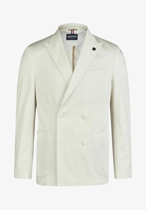Dubbelzijdige blazer in crèmekleurige katoen. Opvallende kenmerken zijn de pieklapels, twee voorzakken en een enkele borstzak. Gladde textuur.