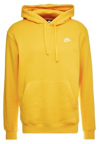 Žlutá bavlněná mikina s kapucí na šňůrku, dlouhými rukávy, přední kapsou a malým bílým logem na hrudi. Hladká textura.