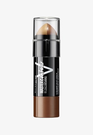 V-shape dual-ended contour stick in black and bronze packaging, with a clear cap revealing a domed brown product tip. "Master Contour" text visible.