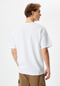Koton LOOSE FIT CREW NECK SHORT SLEEVE - T-paita - white