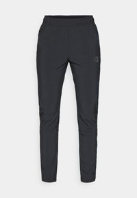 Juodos sportinės kelnės su elastinga juosmena, su šoninėmis kišenėmis ir logotipo detale. Pagamintos iš lygaus, lengvo audinio.