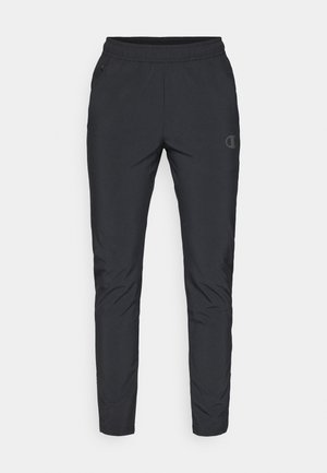Czarne spodnie sportowe z elastycznym paskiem, z kieszeniami bocznymi i detalem z logo. Wykonane z gładkiego, lekkiego materiału.