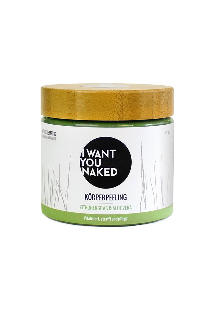 Grön burk med ett lock av bambu. Etiketten har svart text på vit bakgrund och beskriver kroppsskrubb med citrongräs och aloe vera.