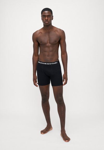 Zwarte boxershorts met een zachte, elastische tailleband met het witte logo "Billionaire Boys Club". Glad materiaal en een strakke pasvorm.