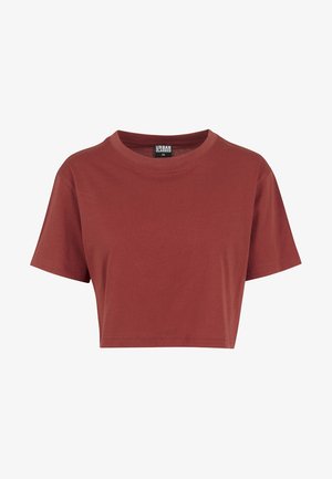 Tričko s krátkym rukávom vo farbe hrdze, vyrobené z bavlny. Má okrúhly výstrih a voľný strih. Na etikete je značka "Urban Classics".