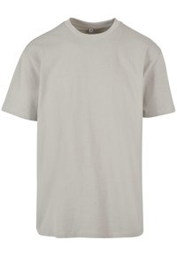 Light gray short-sleeve cotton T-shirt with a crew neck and a straight hem. Smooth texture, no visible patterns or accents. Size tag visible.
