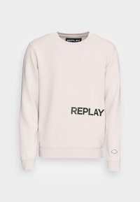 Ljusrosa sweatshirt med lång ärm, rund halsringning och "REPLAY"-logotyp i fet svart på framsidan nedtill; har en diamantdetalj på ärmen.