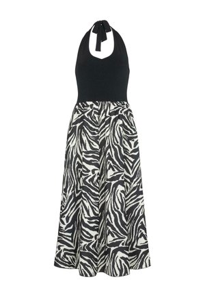 Halternekkjurk met een zwarte top en een vloeiende, knie-lange rok met een zwart-wit zebra patroon. Zachte stof, casual ontwerp.