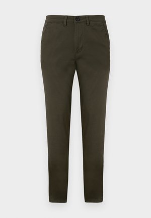 Pantalons vert olive foncé à coupe slim, en coton. Dotés d'une fermeture à bouton et de poches latérales. Texture lisse, jambes droites.