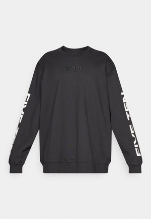 Sort sweatshirt lavet af blødt stof, med rund hals, lange ærmer og "5.10"-logo broderet med mørk tråd på brystet.