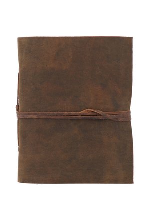 Brown leather-bound journal closed and secured with a wraparound strap on a white background.