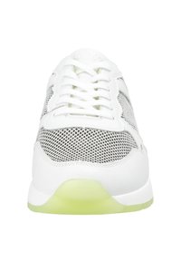 White athletic sneaker with mesh and leather accents, featuring green translucent sole and symmetrical lace-up design. Textured surface detail.