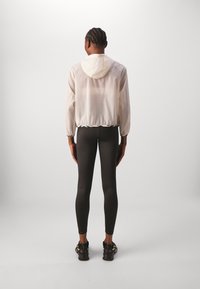 Puma ANIMAL REMIX FASHION - Trainingsvest - sugared almond