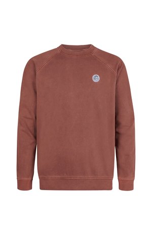 Puuvillainen rustonvärinen collegepaita raglanhihoilla, resorilla hihoissa ja helmassa sekä pienellä pyöreällä logolla vasemmassa rinnassa.