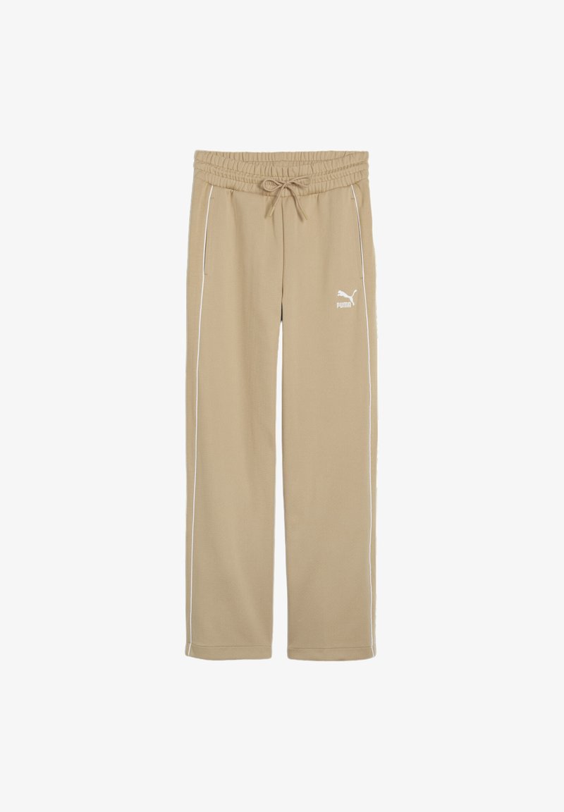 Pantalones de chándal beige con cinturilla elástica, cordón y ribete blanco en los laterales. Presenta un pequeño logo blanco en el muslo izquierdo. Tejido suave y texturizado.