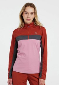 Dlouhý rukáv sportovní top s límcem na zip, design v barevných blocích v růžové, šedé a červené barvě, s logem na horní levé části hrudi.