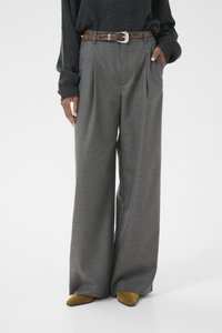 Gray wide-leg trousers with a textured finish, featuring front pleats and a brown, patterned belt with a silver buckle. Styled with mustard heels.