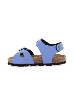 Sandalo blu open toe con cinturini regolabili, soletta in sughero e suola in gomma nera, mostrato di profilo su sfondo bianco.