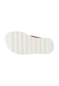Sohlen von Sandalen, weißes Gummi mit horizontalen Rillen und Vertiefungen für Trittfestigkeit. Leicht abgerundete Zehenpartie für Komfort und Stabilität.