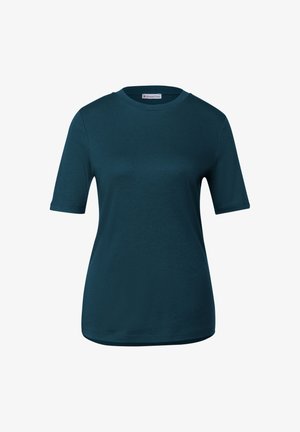 Turkusowy T-shirt z krótkim rękawem, wykonany z miękkiej bawełny. Posiada okrągły dekolt oraz luźny krój. Gładka tekstura, bez widocznych wzorów czy akcesoriów.