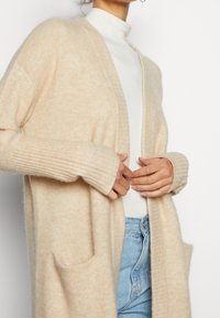 OPUS Neuletakki - beige