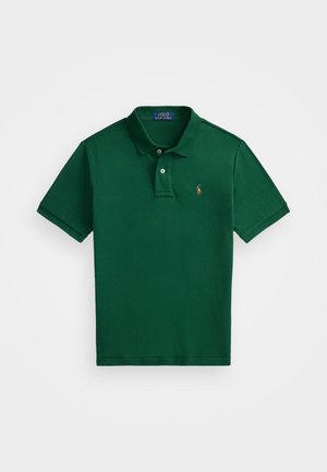 Tmavozelená bavlnená polokošeľa s dvojitým zapínaním, krátkymi rukávmi a malým vyšitým logom na ľavej hrudi.