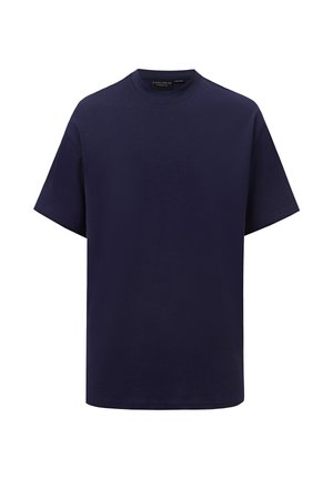 T-shirt bleu marine à manches courtes et col rond, coupe régulière avec étiquette de marque visible à l’intérieur du col.