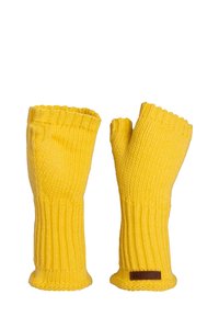 Geel gebreide vingerloze handschoenen met geribbelde manchetten en een leren merklabel. Zachte textuur en open vingertoppen voor behendigheid.