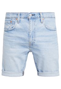 Světlemodré džíny šortky s klasickým designem, ohrnutým lemem, pěti kapsami a kovovým zapínáním. Hladká textura, minimální vyblednutí.