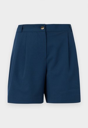 Marineblauwe op maat gemaakte korte broek met voorplooien, riemlussen en een gouden knoopsluiting in de taille.