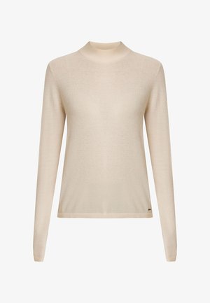 Suéter beige de manga larga tipo cuello de tortuga, textura suave, diseño ajustado, puños y dobladillo acanalados, con un pequeño detalle de logo en la parte inferior izquierda.