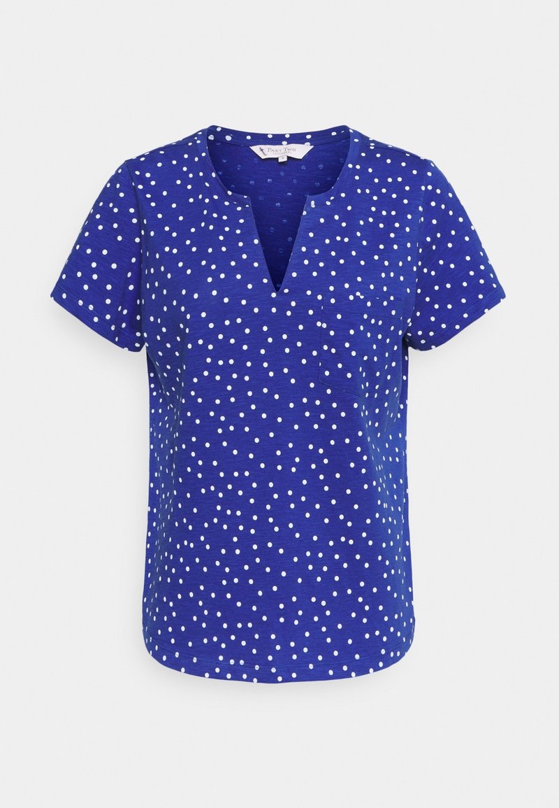 Blue short-sleeve top featuring a V-neck, made from a textured fabric, adorned with white polka dots throughout. Casual design with a relaxed fit.