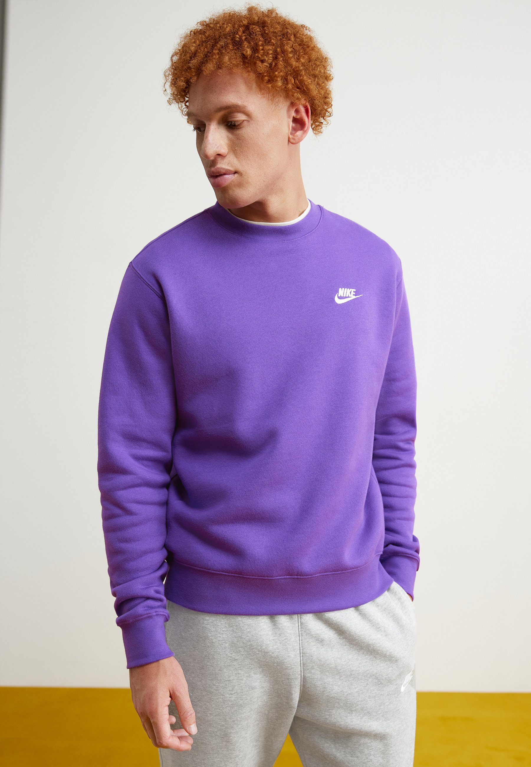 purple nike sweatshirt