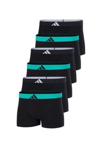 Kuusi mustaa boxeriinimuotoista alushousuja pinoittain. Jokaisessa on turkoosi vyötärö, jossa on Adidas-logo. Materiaali vaikuttaa sileältä ja tiukalta.