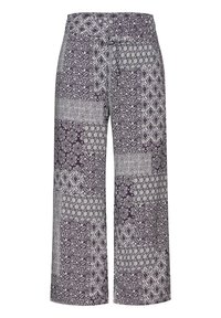 Paars en wit gemusterde wijde broek met een trekkoord in de taille. Bevat verschillende bloem- en geometrische ontwerpen over de stof.