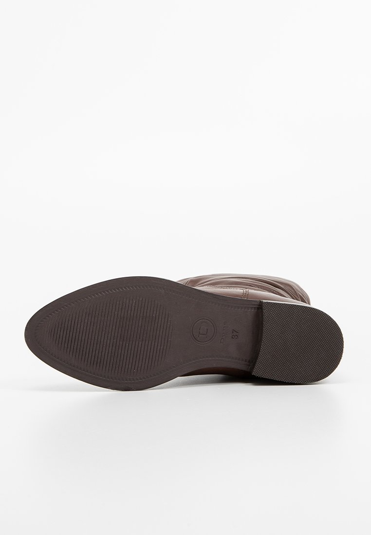 Brown leather boot sole with textured rubber grip, rounded shape, and embossed logo. Size marked as 37, featuring ribbed detailing.