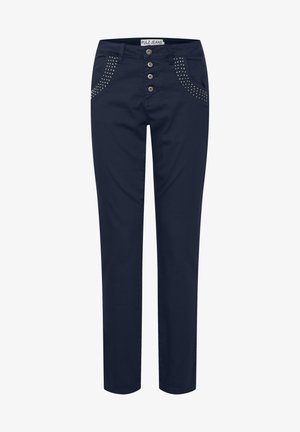 Tamsiai mėlynos kelnių, pasižyminčių liekna forma, priekinėse kišenėse su dekoratyviniais smaigaliais ir penkių mygtukų uždarymu. Lygi tekstūra.