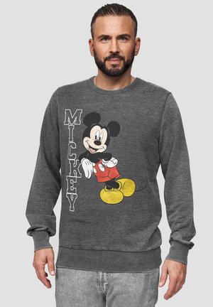 Sudadera gris con puños y dobladillo acanalados que presenta un gran gráfico impreso de Mickey Mouse en colores negro, rojo, amarillo y blanco.