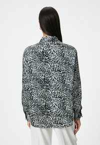 Koton LEOPAR PRINTED - Paitapusero - black